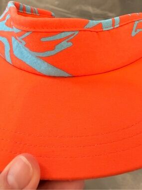 NWT The North Face Orange Visor with Light Blue Strap